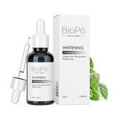 A bottle of BioPo Skin Care Whitening Serum with a dropper, next to its packaging box featuring green leaf accents.