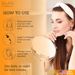 Woman applying skincare vital serum with product instructions on an orange background.